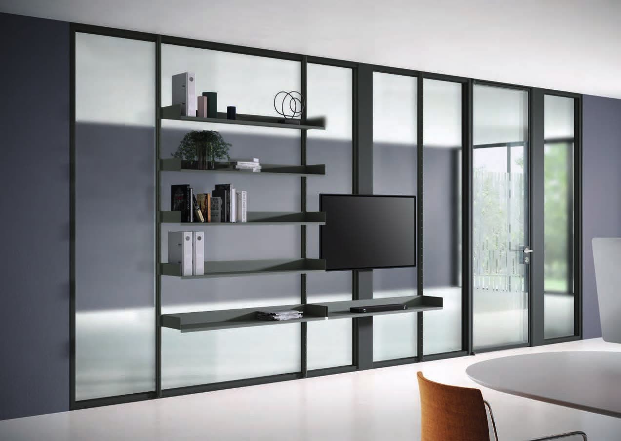 Glazed partition with shelves and a television fixed to its uprights