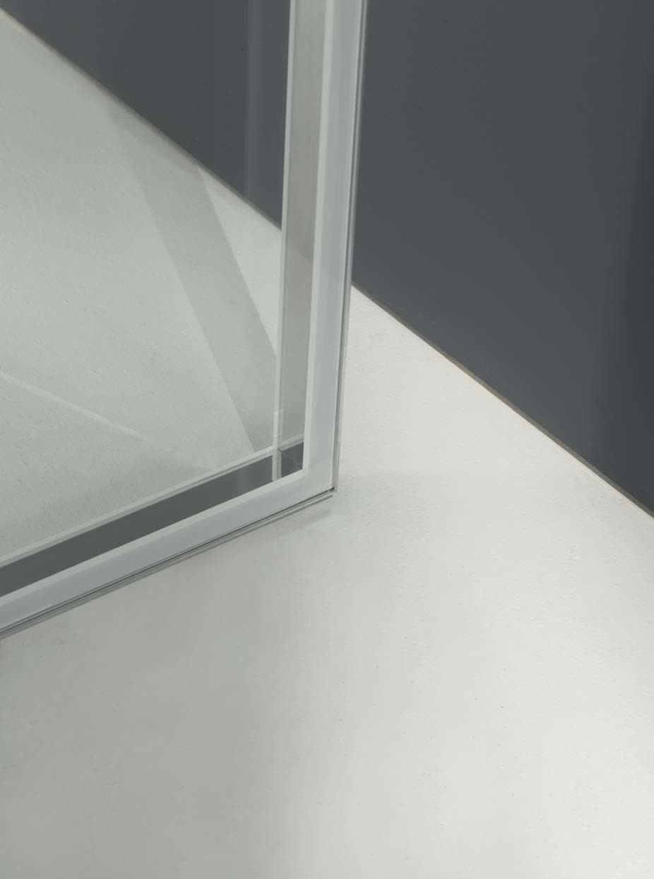 Close-up of the slim aluminium corner profile of a glazed partition