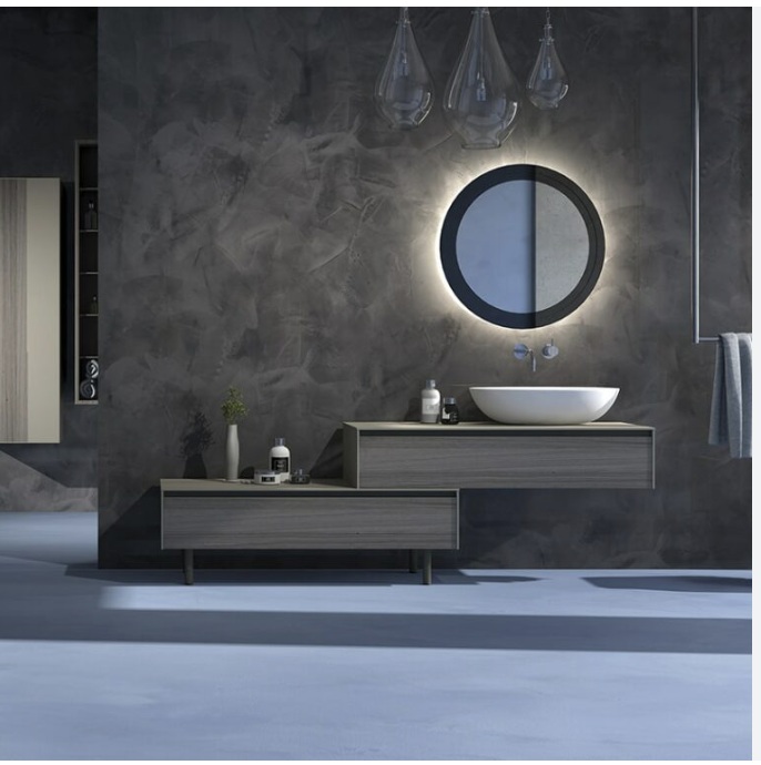 Bathroom with charcoal hand-trowelled walls, a floating timber vanity, a vessel basin and a backlit round mirror